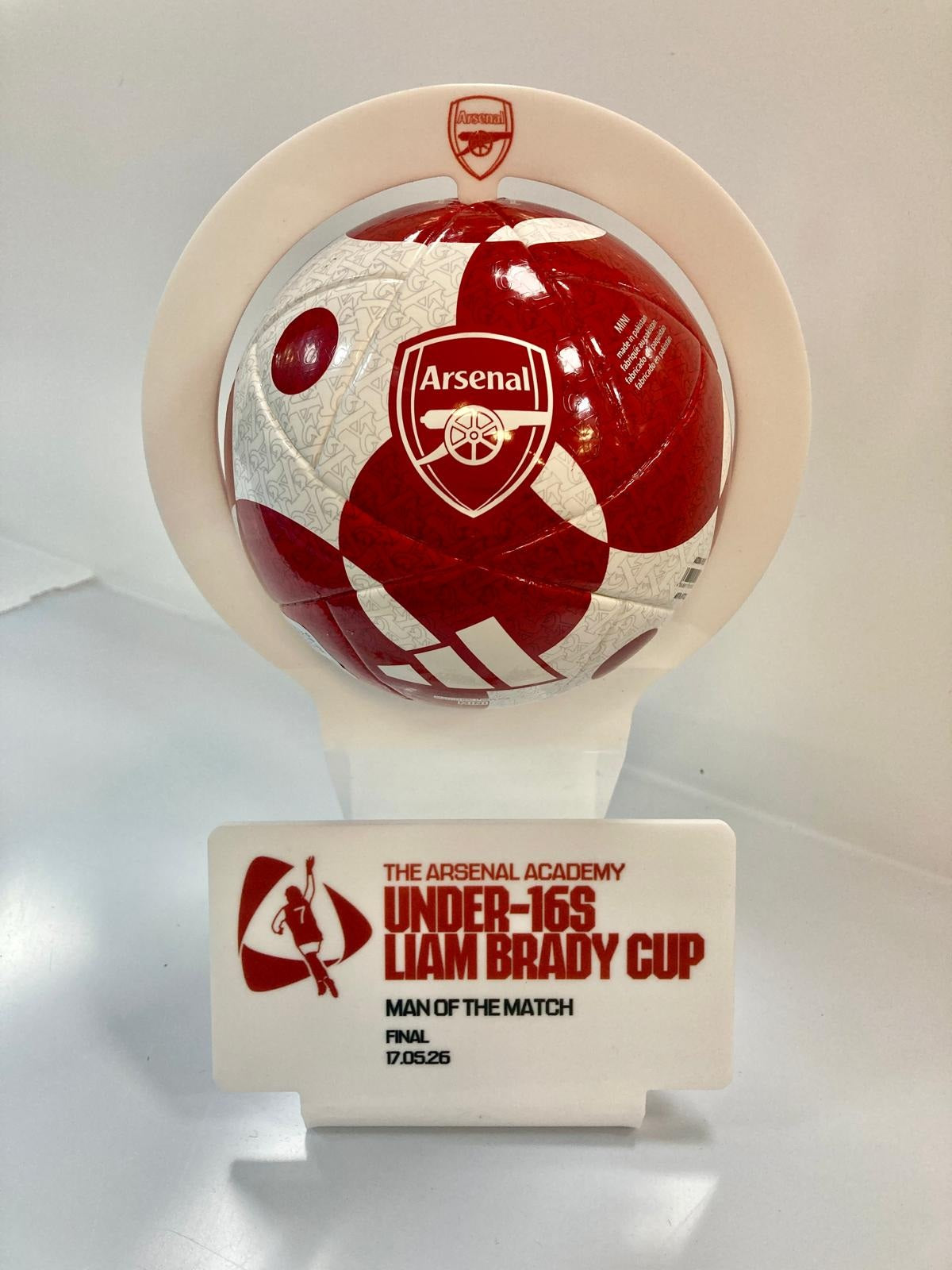 Acrylic football display stand with a printed trophy plaque